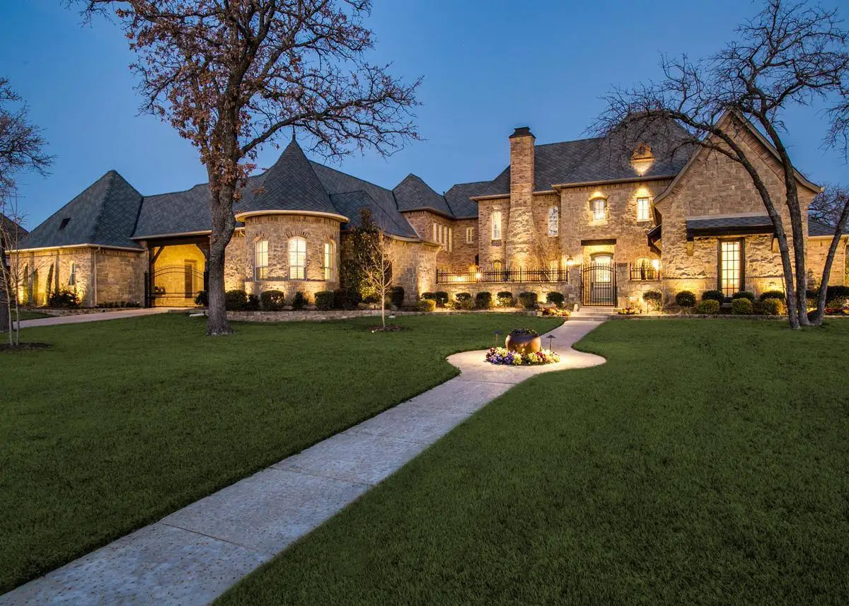 THARP exterior lighting at a stone home